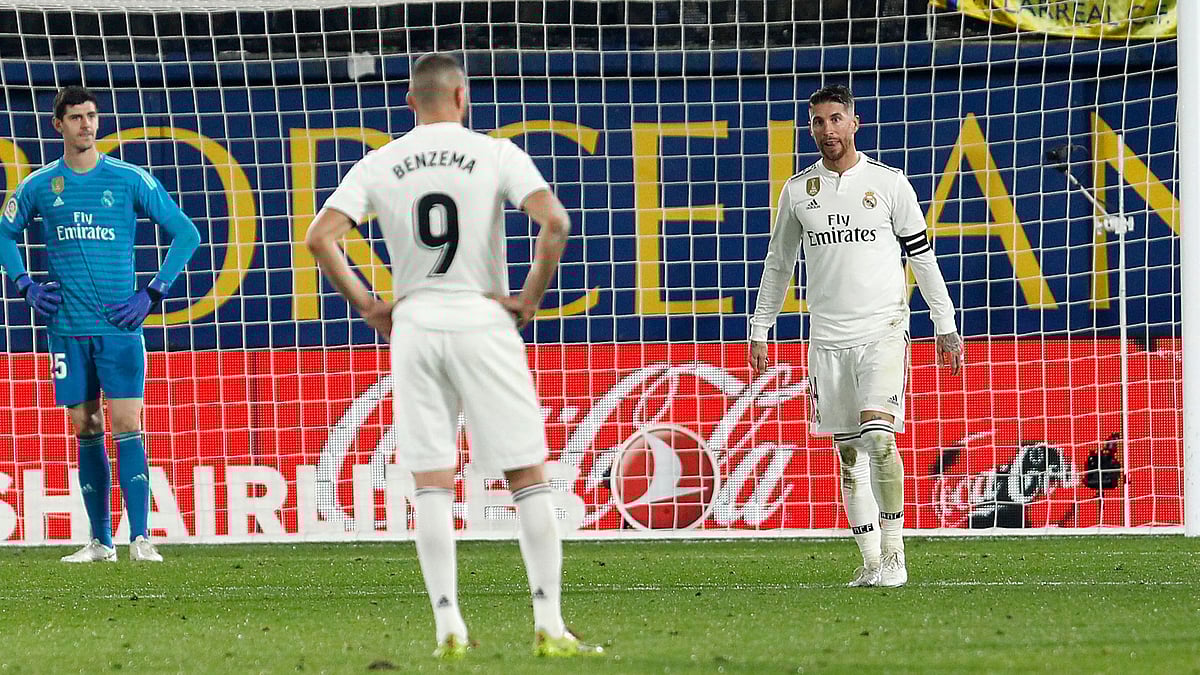 Real Madrid players cut a forlorn figure during their shock 2-0 defeat at home against Real Sociedad.