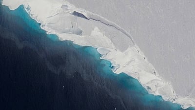 NASA scientists have discovered a gigantic cavity -- almost 300 metres tall -- growing at the bottom of Thwaites Glacier in West Antarctica, indicating how fast global sea levels will rise in response to climate change. (Photo Credit: NASA)