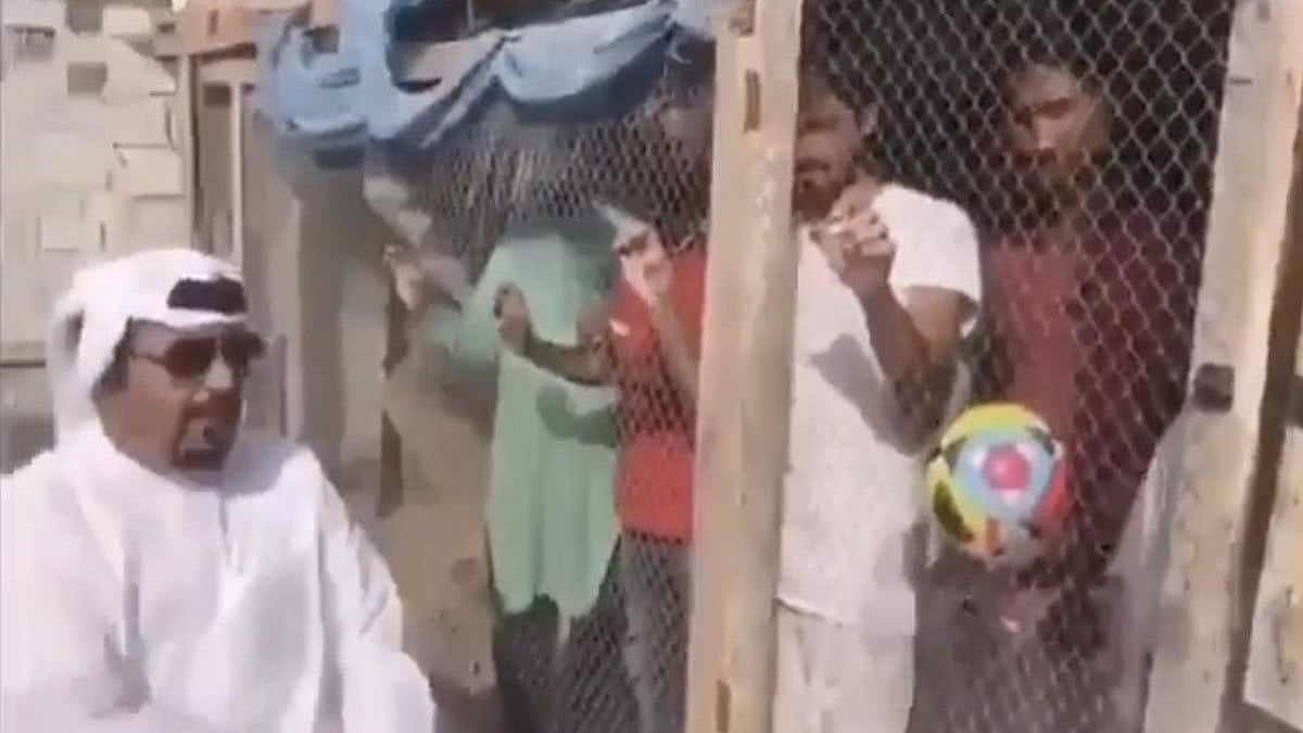 A screen grab from the video in which a man in UAE puts fans of the Indian football team into a bird cage.