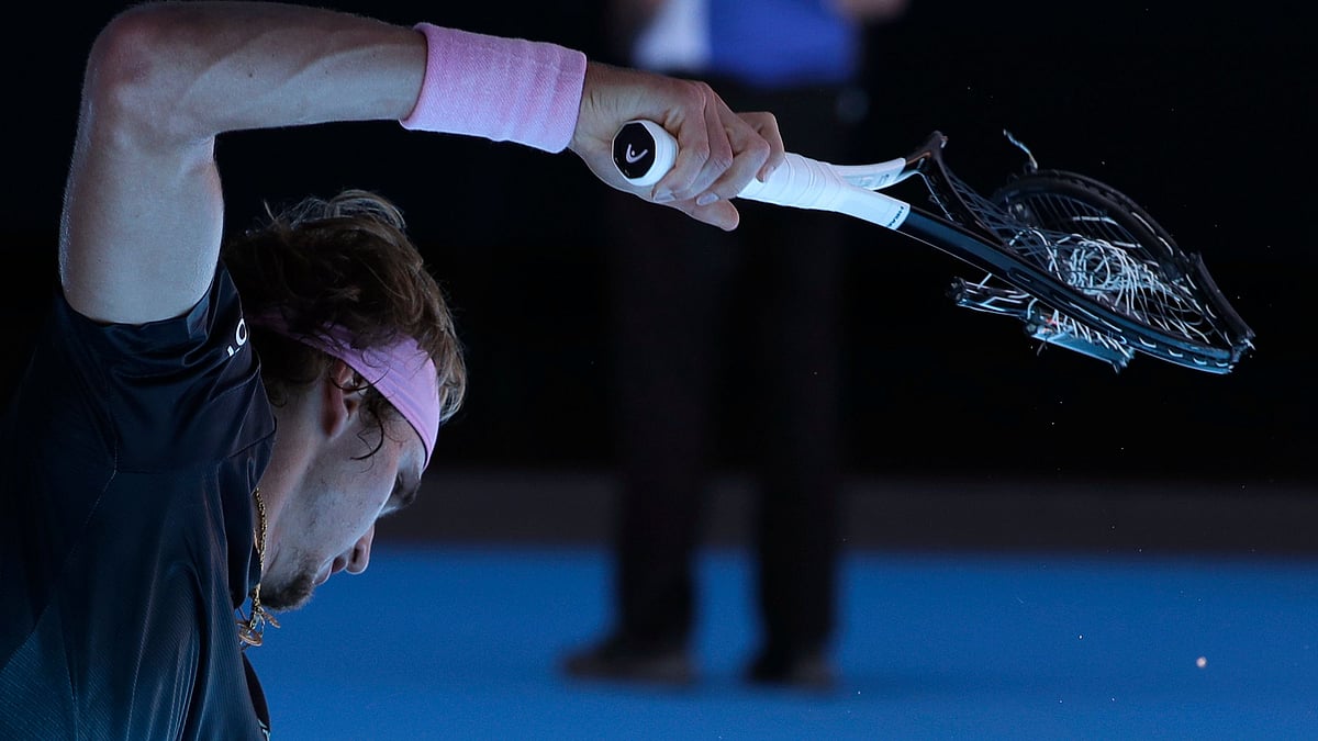 The 21-year-old Zverev destroyed his racket by whacking it against the ground 8 times – and then tossing it aside.