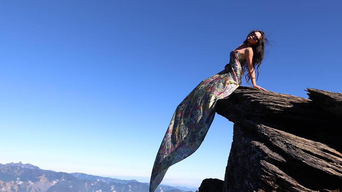  Wu (36) built up a sizeable social media following through photos of herself at the top of mountains dressed in bikinis.