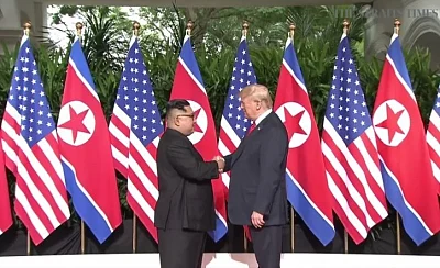 U.S. President Donald Trump (R) shakes hands with North Korean leader Kim Jong-un. (Yonhap/IANS)