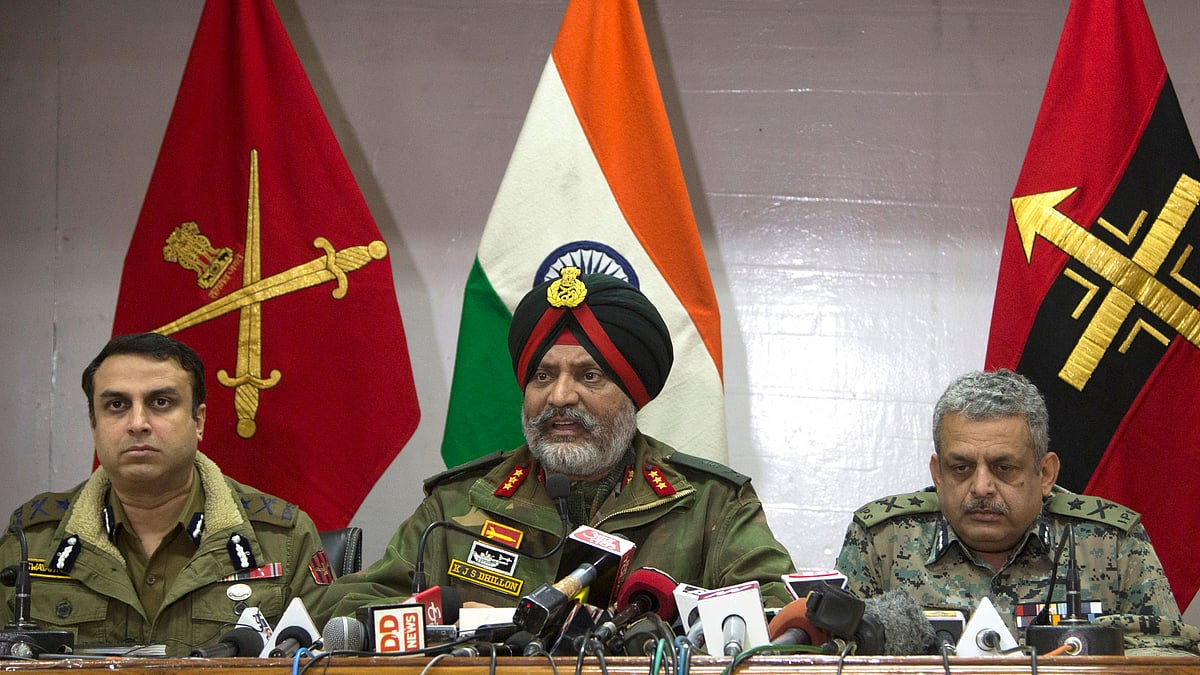Indian Army’s General Officer Commanding of the Srinagar-based 15 Corps Lt. Gen. KJS Dhillon, center, speaks as Inspector General of Police Swayam Prakash Pani, left, and Inspector General of Central Reserve Police Force (CRPF) operation Zulfiqar Hassan sit by his side during a joint press conference in Srinagar.
