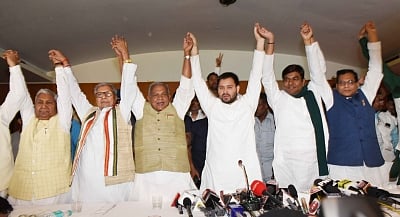 Patna: Rashtriya Janata Dal (RJD) leader Tejashwi Yadav, Hindustani Awam Morcha (HAM) chief Jitan Ram Manjhi, Vikasshil Insan Party (VIP) chief Mukesh Sahni, RSLP chief general secretary Satyanand Prasad Dangi and Bihar RJD President Ramchandra Purbey during a press conference to announce the formal allocation of 31 of the total 40 Lok Sabha seats in the state for the 2019 Lok Sabah elections, in Patna on March 29, 2019. (Photo: IANS)