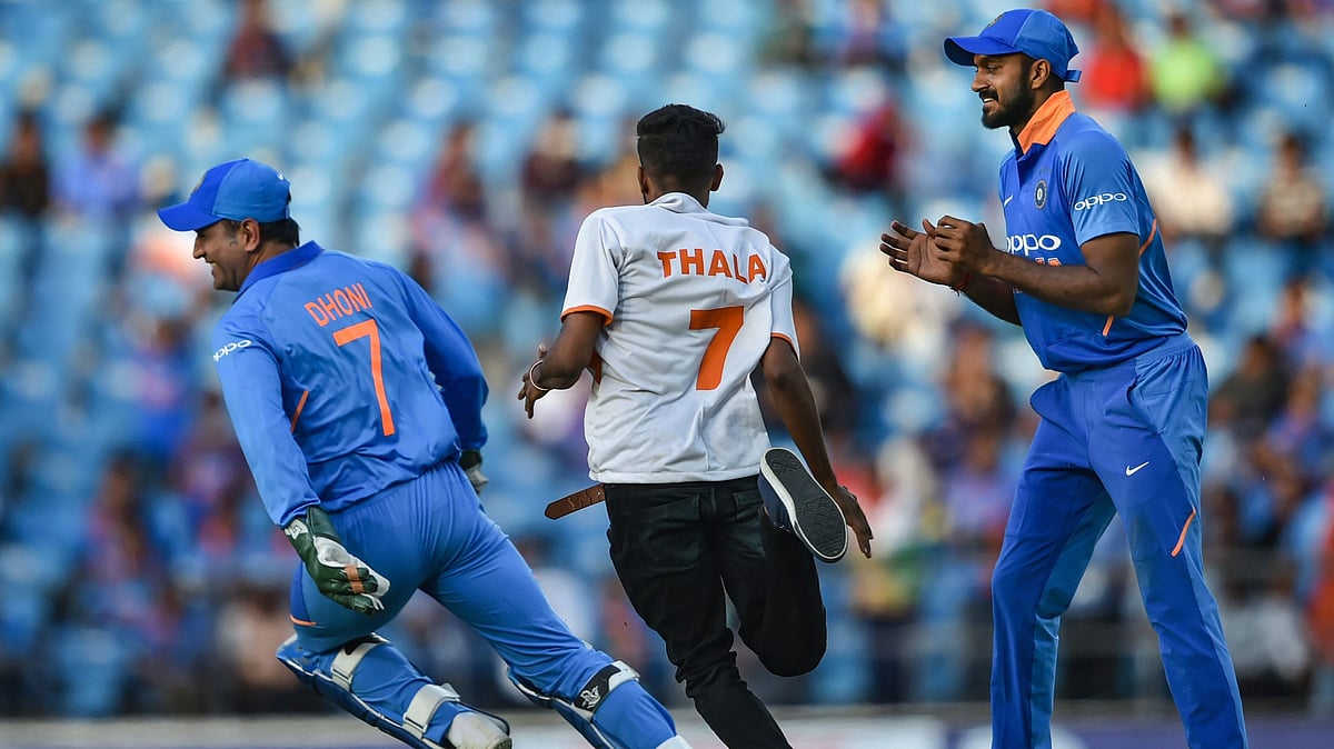 The man, clad in a white T-shirt, ran after his idol, who relented after a few seconds and embraced him.