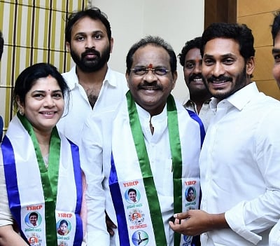 Hyderabad: TDP MP Thota Narasimham and his wife Vani join YSR Congress Party in the presence of party president Y. S. Jaganmohan Reddy in Hyderabad on March 13, 2019. (Photo: IANS)