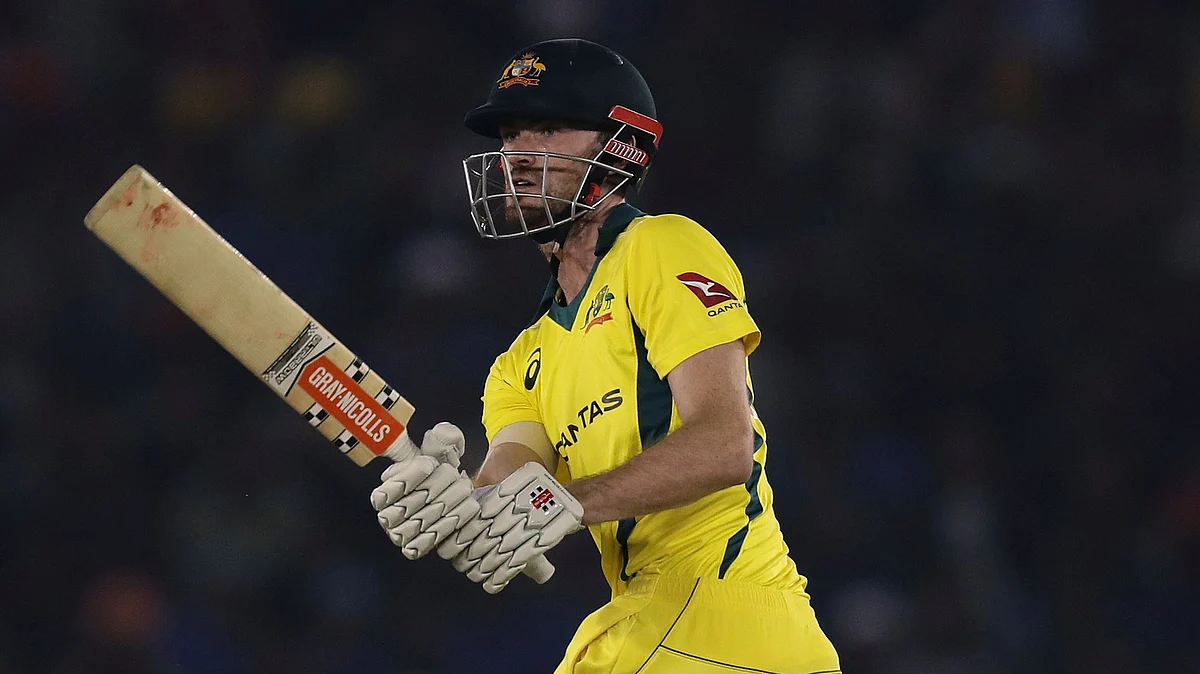 Australia’s Ashton Turner watches the ball after hitting it for a six during the fourth one day international cricket match between India and Australia in Mohali.