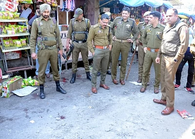 Jammu: Security personnel carry out investigation at the site, where a blast took place after a grenade attack by militants at the busy main bus terminus in Jammu and Kashmir, on March 7, 2019. Reportedly, 18 people were injured and five of them critical. (Photo: IANS)