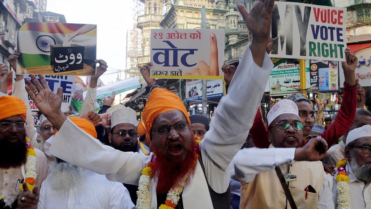 Indian Muslims shout slogans as they participate in a rally urging people to cast their votes, in Mumbai, India, Thursday, 14 March, 2019. India’s national election will be held in seven phases in April and May.
