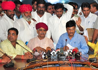 Jaipur: Gujjar leader Kirori Singh Bainsla addresses a press conference after a meeting with Rajasthan ministers in Jaipur, on May 28, 2015. (Photo: Ravi Shankar Vyas/IANS)
