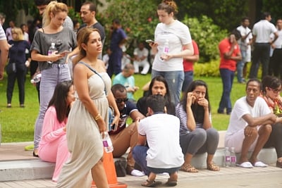 Colombo, April 21, 2019 (Xinhua) -- Visitors wait outside a hotel where a blast took place in Colombo, Sri Lanka, April 21, 2019. At least 50 people were killed and more than 100 others injured in multiple church and hotel blasts in Sri Lanka, police said on Sunday. (Xinhua/Tang Lu/IANS)