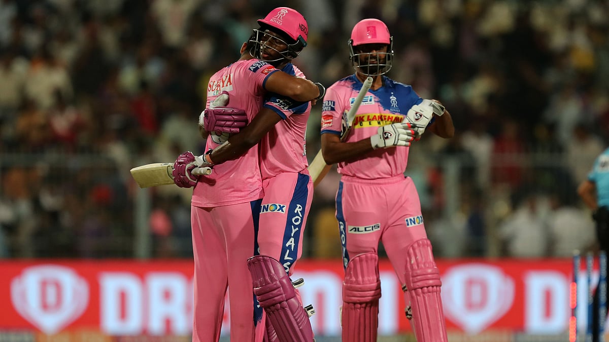 Rajasthan Royals’ Riyan Parag celebrates with Jofra Archer after his side beat Kolkata Knight Riders by three wickets in Kolkata on Thursday.