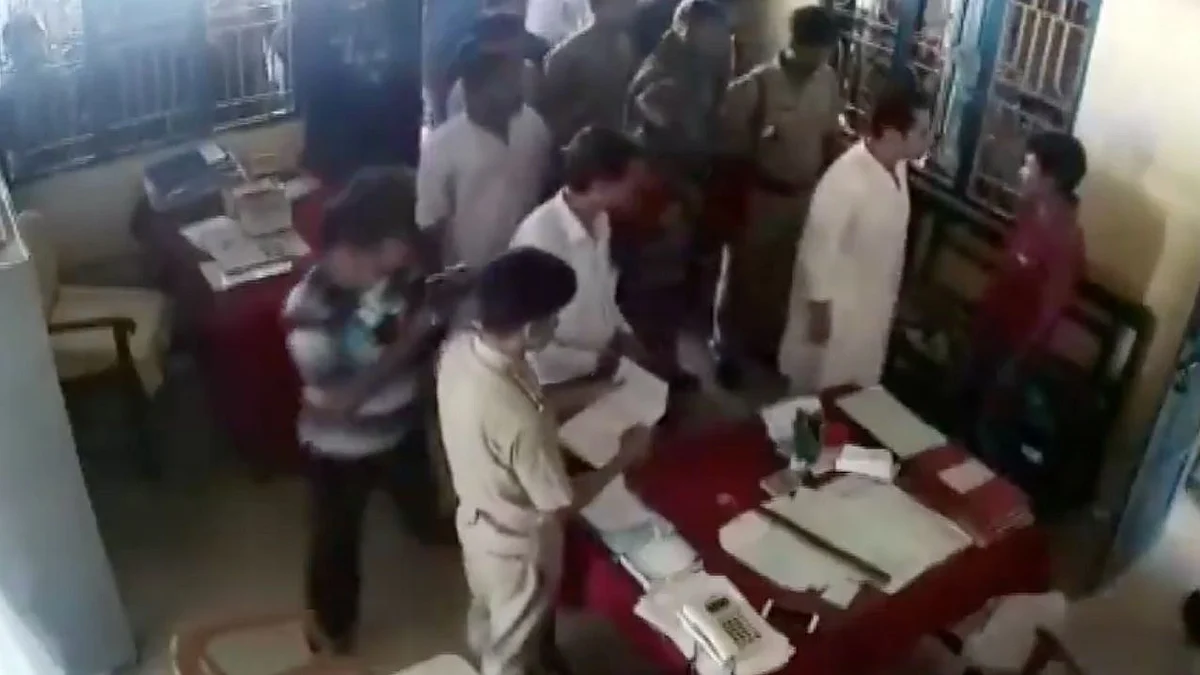The video shows Debburman assaulting Mintu Debbarma inside a police station in Khowai district.