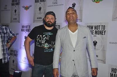 Canadian comedian and actor Russell Peters during the success party of Raj Kundra`s book How Not To Make Money at Royalty Pub in Mumbai on October 27, 2013. (Photo: IANS)