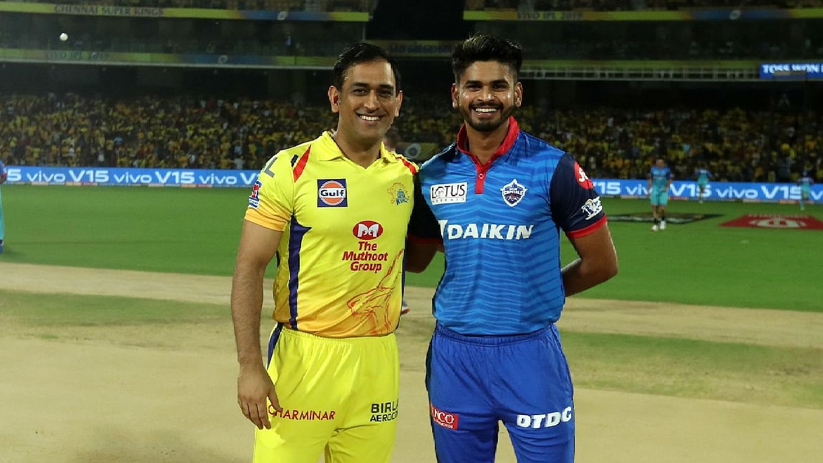 CSK Captain MS Dhoni poses with Delhi Capitals captain Shreyas Iyer.