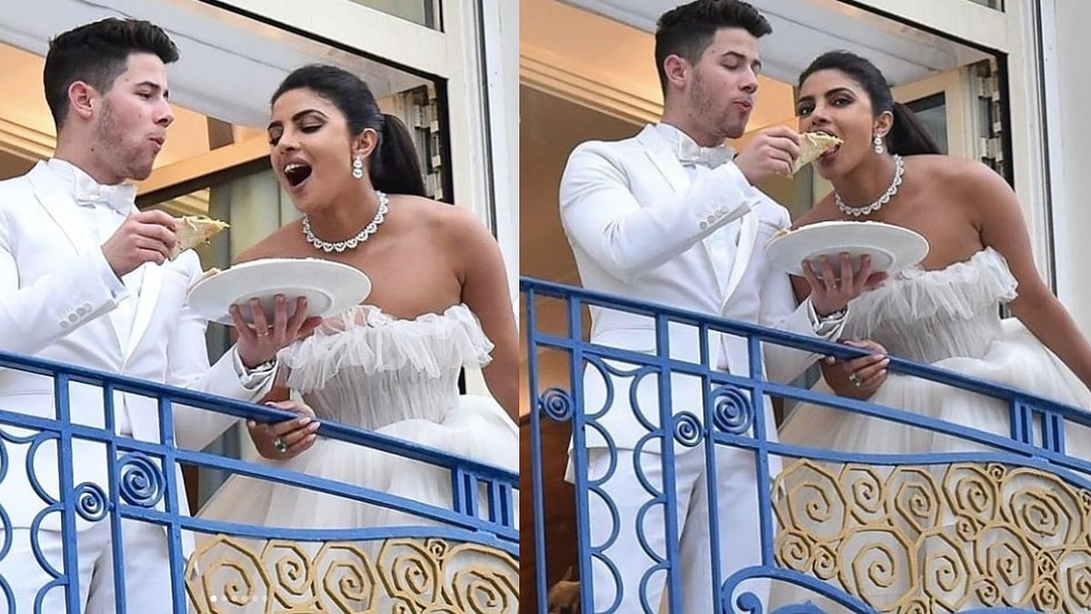 Nick Jonas and Priyanka Chopra enjoying a pizza.&nbsp;
