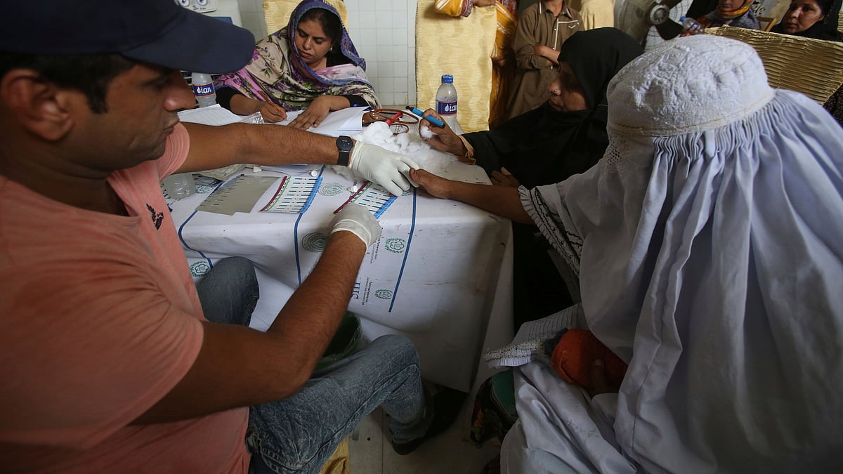 Doctor screening patients for HIV.