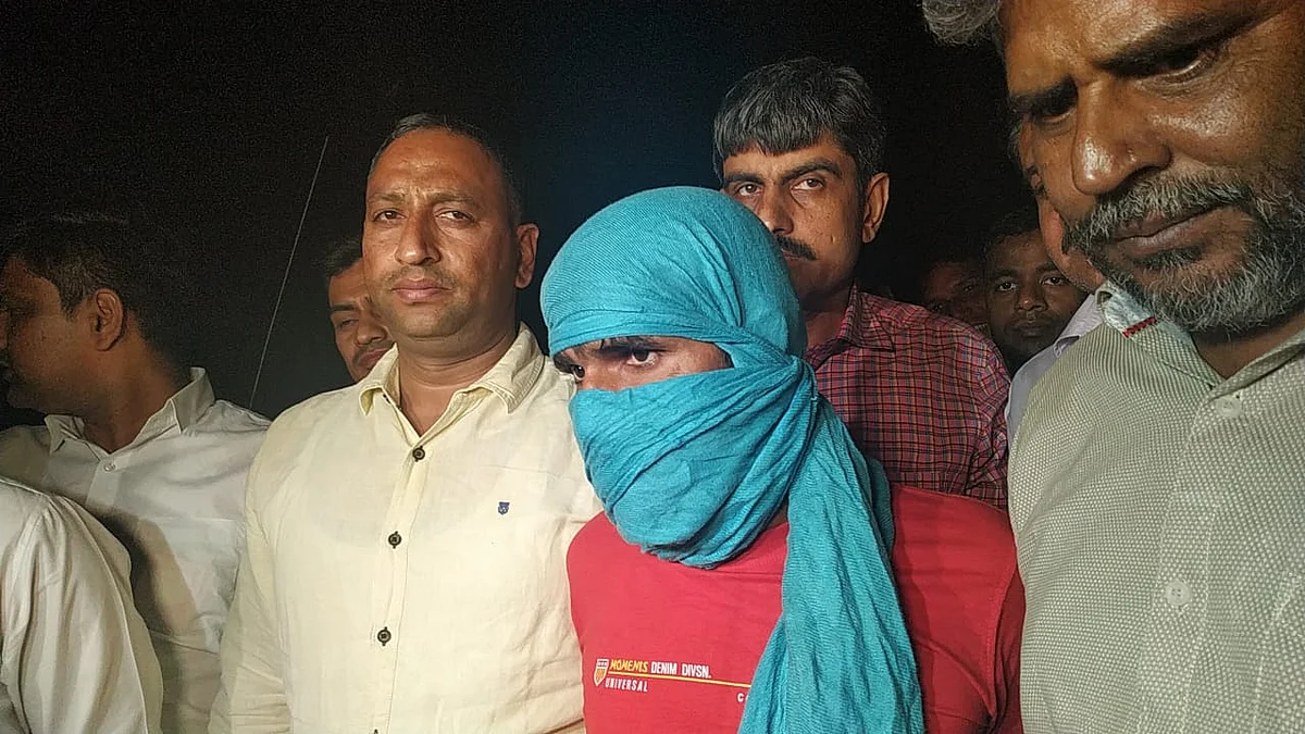 Accused being taken away.