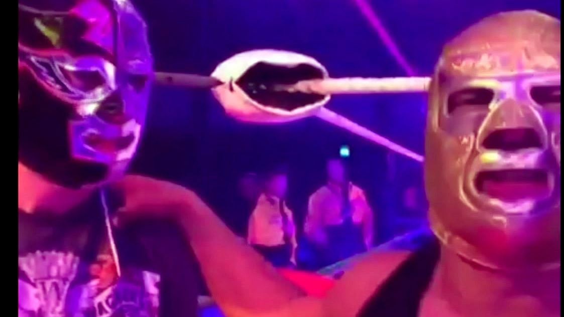 In this image made from video taken on Saturday, May 11, 2019, The Silver King, right, talks to the camera with fan Mark van der Enden at the Roundhouse in London.&nbsp;