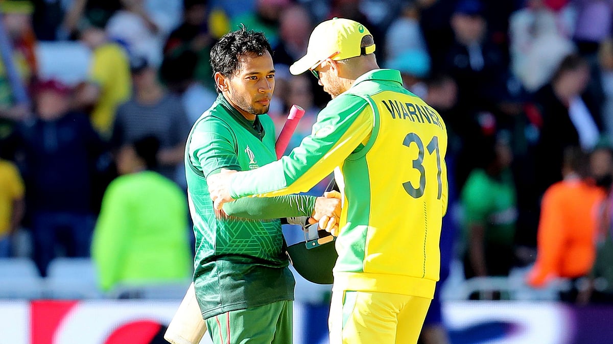 Australia’s David Warner (right) congratulates Bangladesh’s Mushfiqur Rahim at the end of the Cricket World Cup match between Australia and Bangladesh at Trent Bridge in Nottingham on Thursday, 20 June.