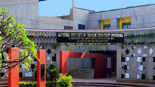 D Srinivas Reddy, a stenographer with the institution, was accused of sexually harassing the housekeeping employees.