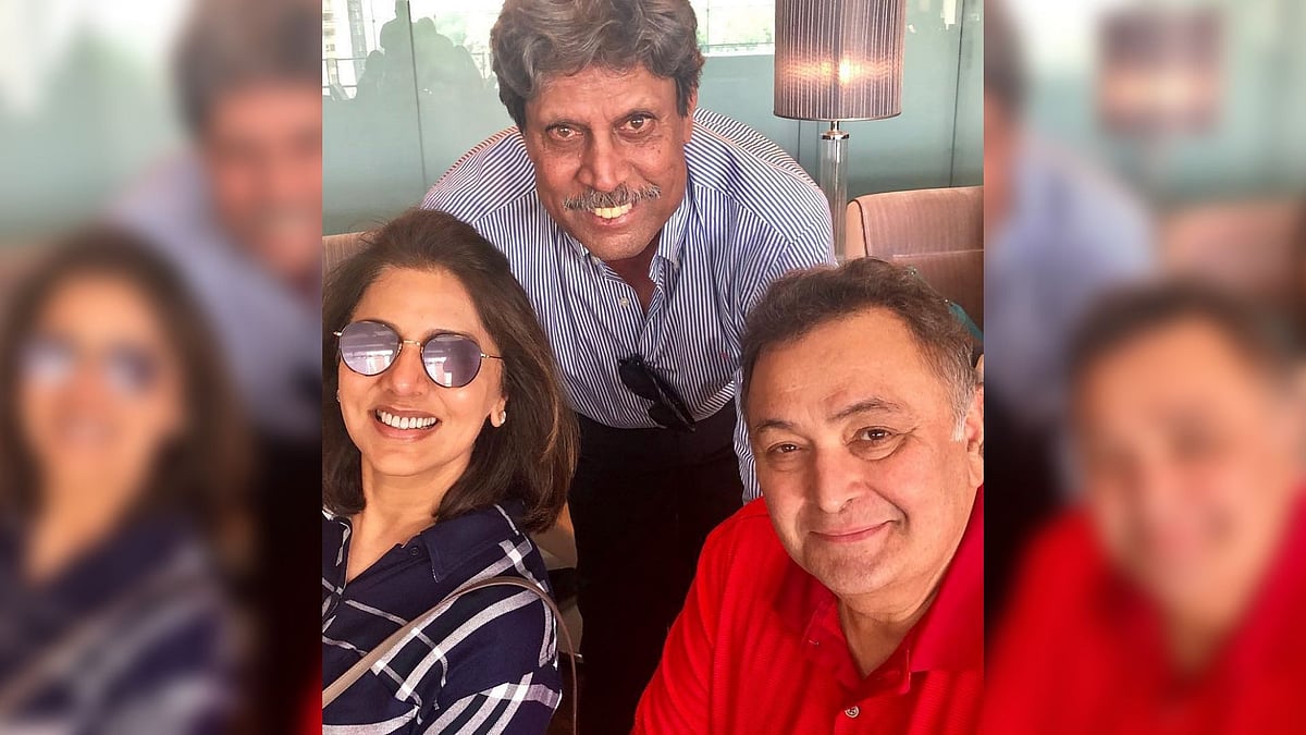 Neetu Kapoor and Rishi Kapoor pose with former Indian skipper Kapil Dev.