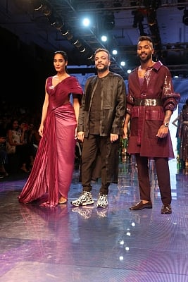 Mumbai: Actress Lisa Haydon and Hardik Pandya showcase creations of fashion designer Amit Aggarwal at the Lakme Fashion Week Winter/Festive 2019 in Mumbai on Aug 21, 2019. (Photo: IANS)
