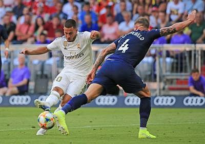 MUNICH, July 31, 2019 (Xinhua) -- Eden Hazard (L) of Real Madrid takes a shot under the defense from Toby Alderweireld of Tottenham Hotspur during their Audi Cup semifinal match in Munich, Germany, on July 30, 2019. Real Madrid lost 0-1. (Photo by Philippe Ruiz/Xinhua/IANS)