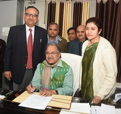 Uttar Pradesh Finance Minister Rajesh Agarwal (C). (Photo: IANS)
