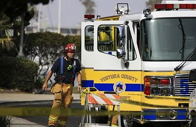 OXNARD (U.S.), Sept. 2, 2019 (Xinhua) -- A firefighter works at the U.S. Coast Guard Station Channel Islands in Oxnard, California, the United States, on Sept. 2, 2019. A total of 34 people are unaccounted for and five crew members were rescued after a dive boat caught fire off Santa Cruz Island in Southern California early Monday morning, according to a press conference at the Coast Guard Station Channel Islands in Oxnard, California. (Xinhua/Li Ying/IANS)