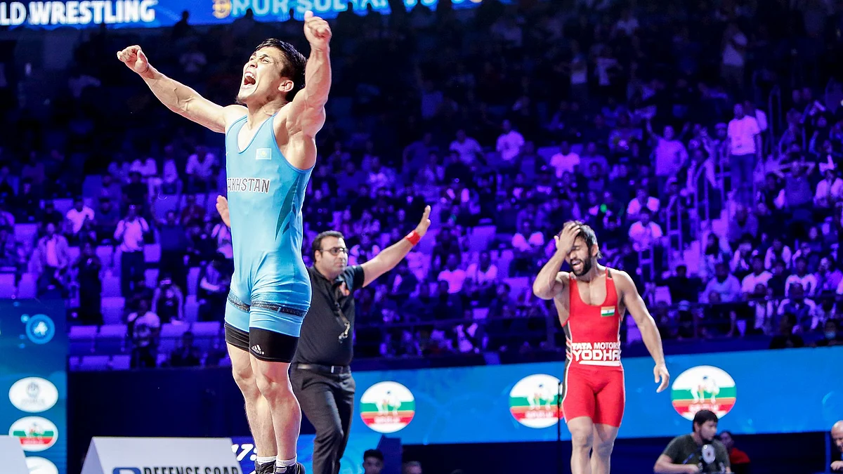 Bajrang Punia reacts after his opponent is awarded the semi-final match.
