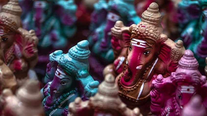 Ganesh idols being arranged in order, ready to be dispatched, in Kosapet.