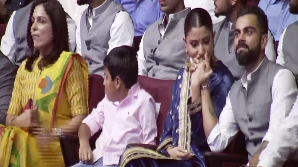 Anushka Sharma kissed Virat Kohli’s hand at an event where the Indian skipper said he was nervous while speaking on stage.