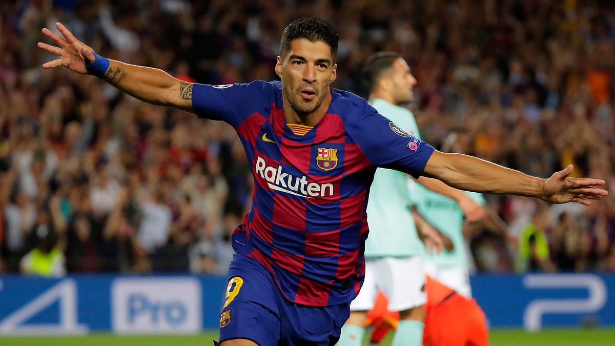 Luis Suarez found the best way to silence his critics at Camp Nou.