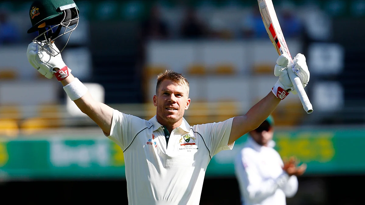 Australia’s David Warner celebrates after scoring 100 runs during their cricket test match against Pakistan in Brisbane, Australia, Friday, Nov. 22, 2019.