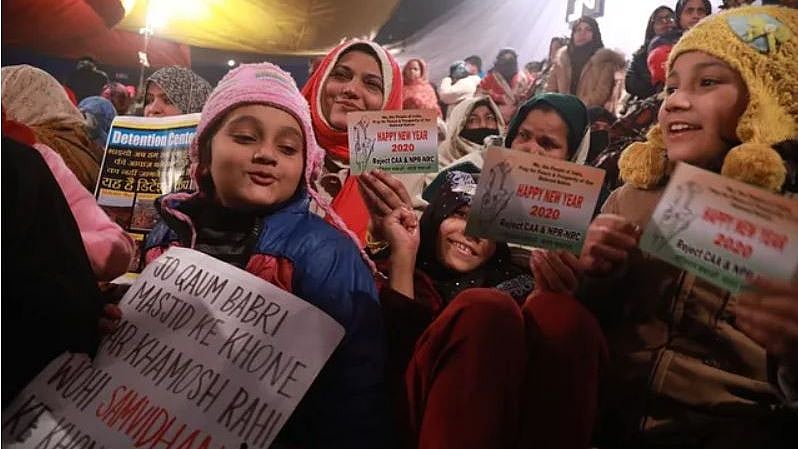 Protesters with their children at Shaheen Bagh.