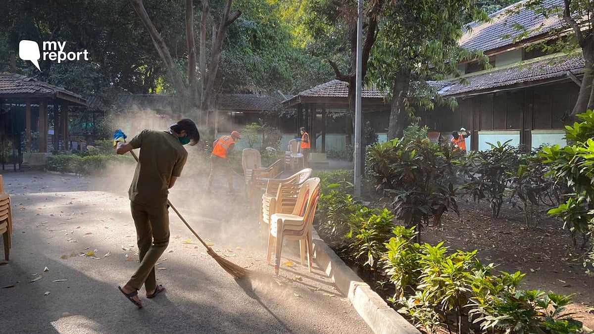 MCGM staff cleaning Kasturba Hospital premise where COVID-19 tests are being conducted in Mumbai.