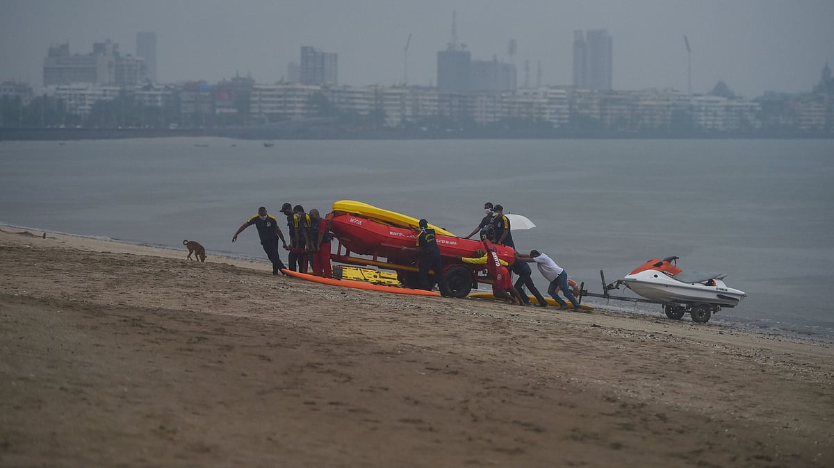 Fire brigade rescue team stationed at Girgaon Chowpatty after a red alert was issued due to the possibility of Cyclone Nisarga, in Mumbai, Tuesday, June 2, 2020.&nbsp;