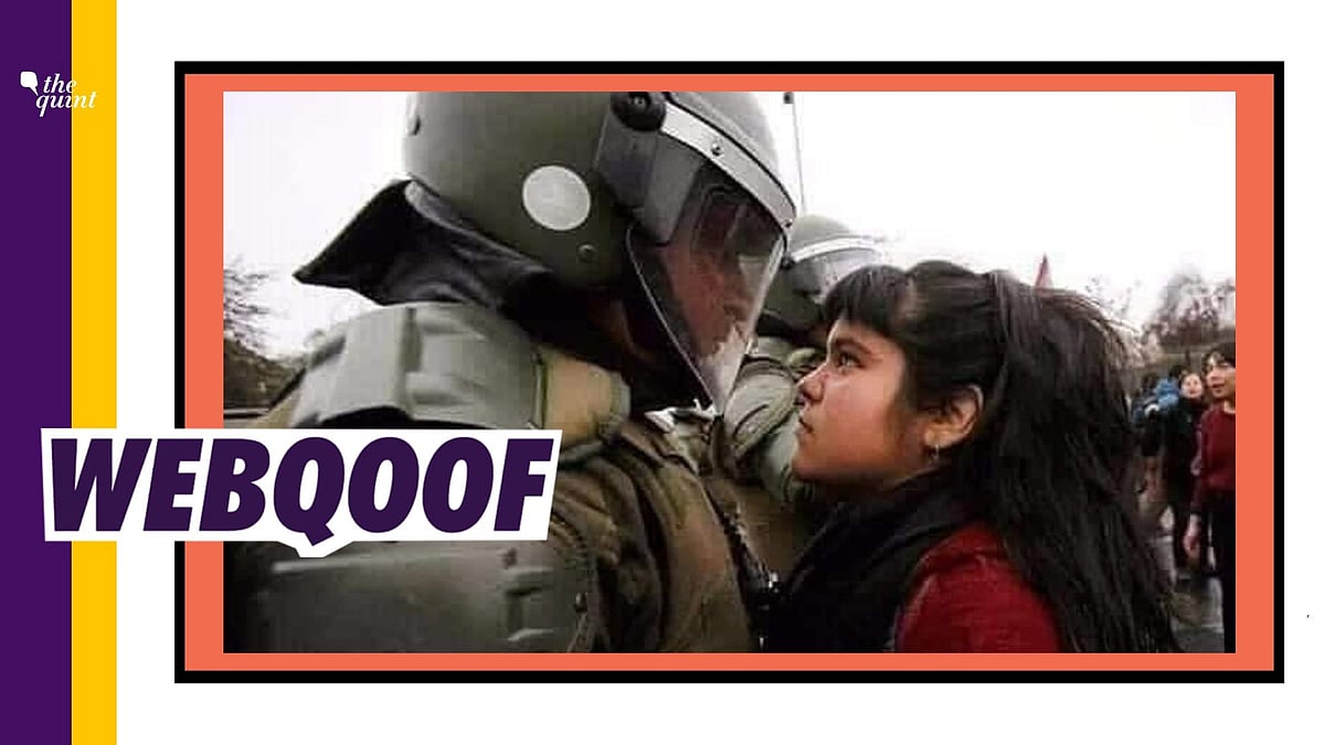 An old image is being falsely shared to claim that it shows a Palestinian woman fighting for Al-Aqsa mosque.