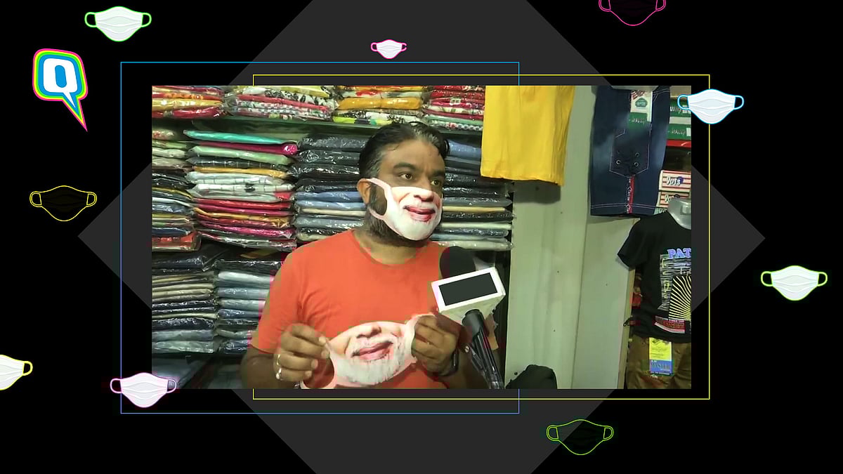 Kunal Pariyani, a clothes seller in Bhopal, is selling Modi-themed masks.