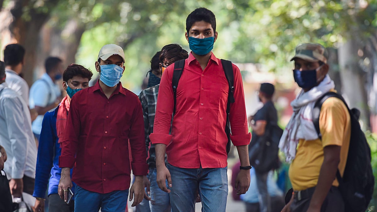 UPSC Civil Services Prelims 2020: Candidates arrive at an examination centre to appear in the Union Public Service Commission (UPSC) prelims exam 2020, in New Delhi, Sunday, 4 October, 2020.