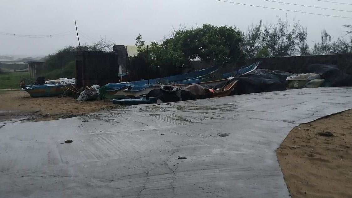 Fisherfolk have moved their boats further into the land and bound tightly to the walls and ground, fearing the heavy winds.