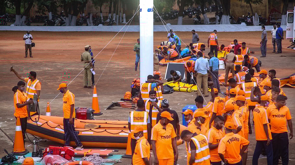 Tamil Nadu Disaster Response Force (TNDRF) personnel prepare themselves ahead of Cyclone Burevi, in Kanyakumari, Wednesday,  2 December, 2020