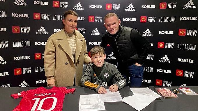 Wayne Rooney with his son Kai at Manchester United.&nbsp;