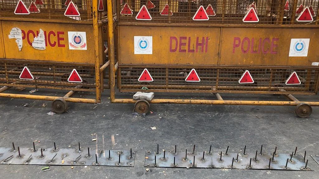Iron nails on the ground at Ghazipur border.
