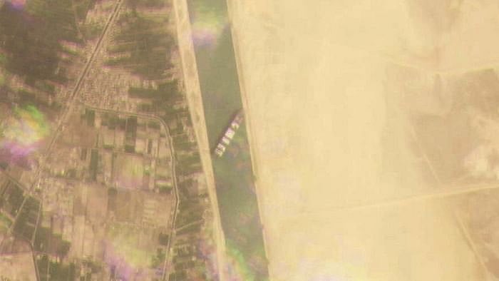 A cargo container ship that’s among the largest in the world has turned sideways and blocked all traffic in Egypt’s Suez Canal.