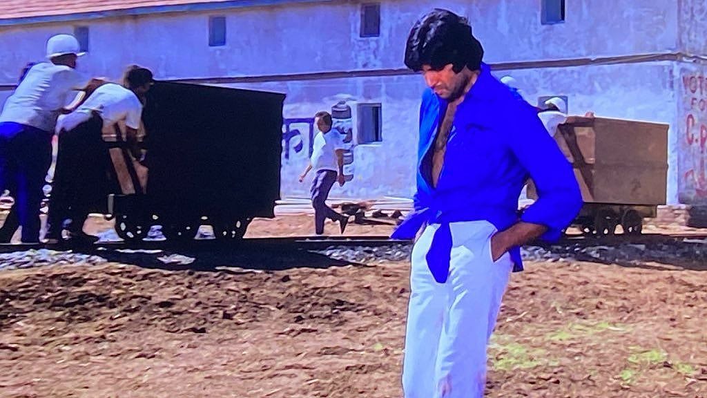 <div class="paragraphs"><p>Amitabh Bachchan in a still from 'Deewar'.&nbsp;</p></div>