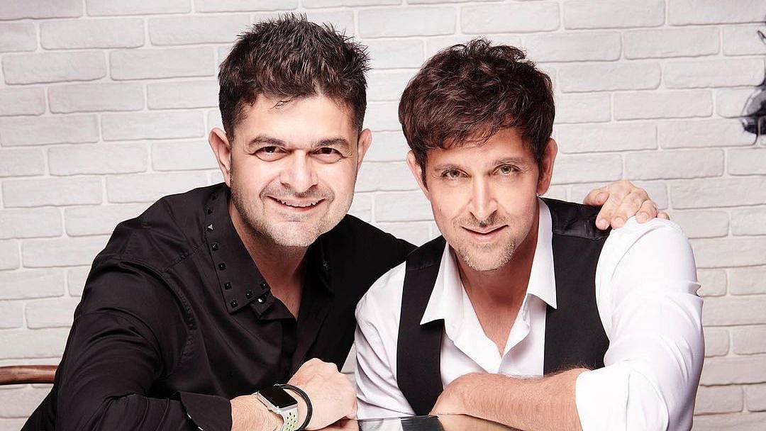 <div class="paragraphs"><p>Dabboo Ratnani with Hrithik Roshan</p></div>