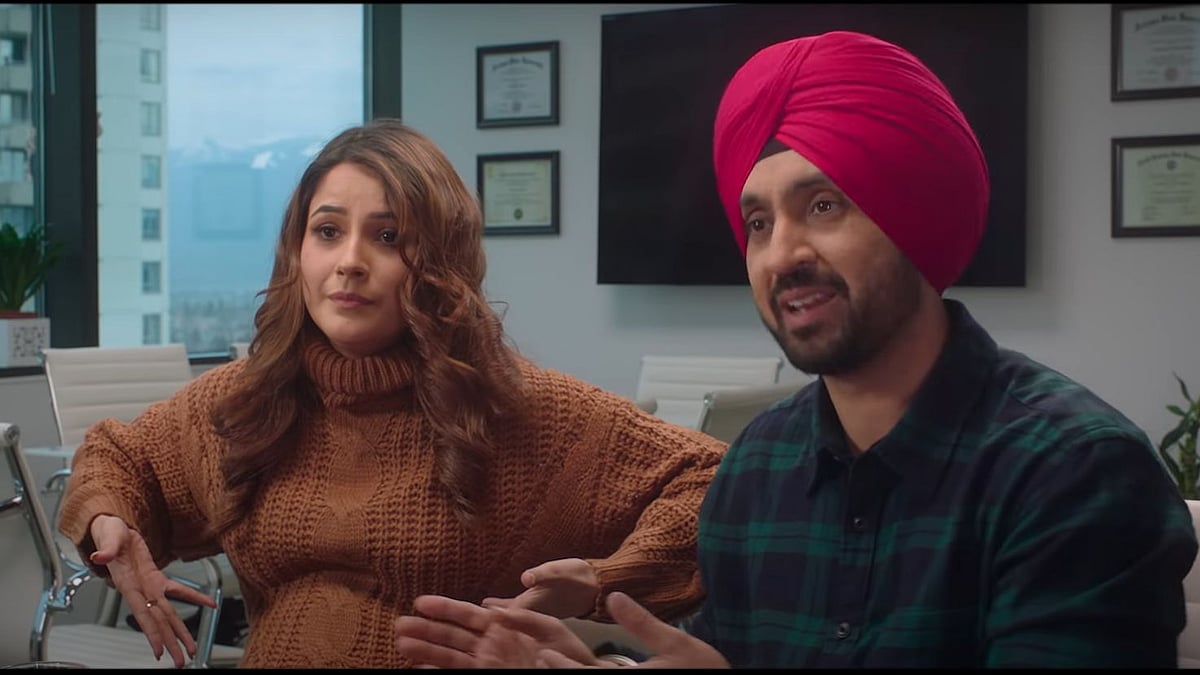 <div class="paragraphs"><p>Diljit Dosanjh and Shehnaaz Gill in <em>Honsla Rakh.</em></p></div>