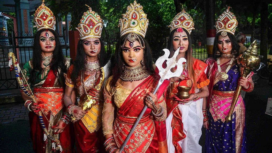 <div class="paragraphs"><p>Varanasi: Artists dressed as deities during a rehearsal ahead of Navratri festival, 1 October.</p></div>